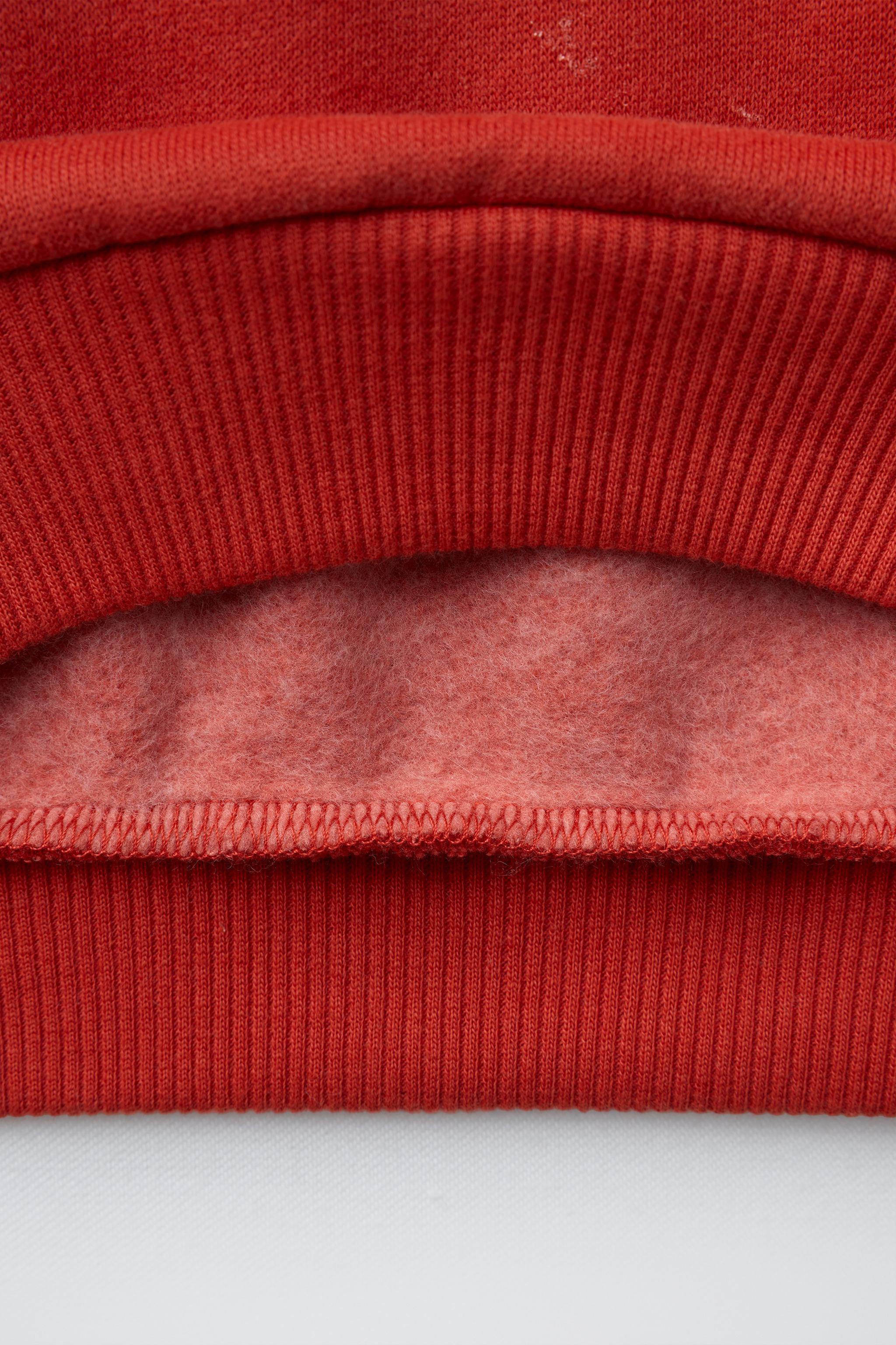SWEAT À INSCRIPTION BRODÉE